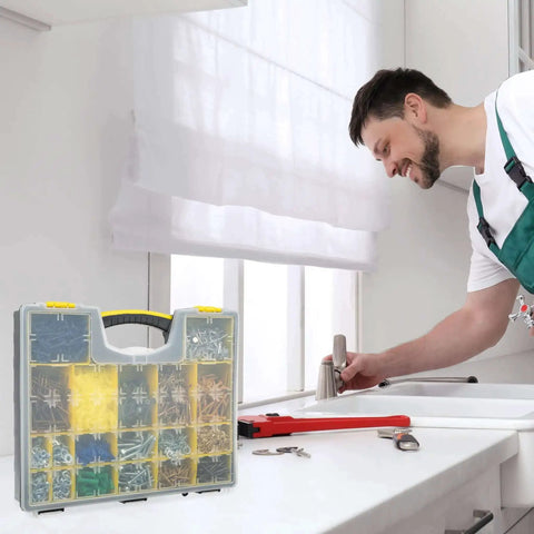 Man using sink with Set Of Four Plastic Clear Top Tool And Parts Organizer Box Set for Grab And Go Garage visible on counter