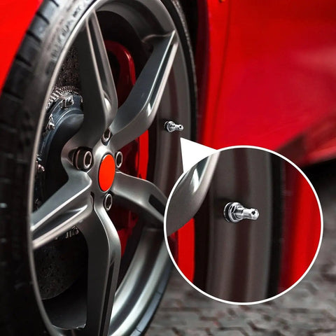4 Pack Metal Tire Valve Stems TR-416-S Outer Mount 1 Inch Core, installed on car wheel, close-up view