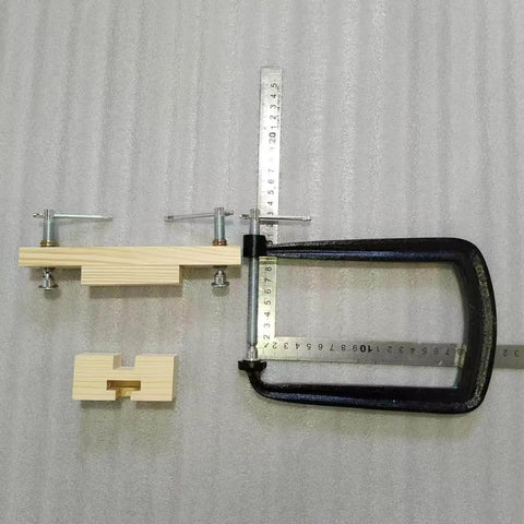 Classical Guitar Bridge Clamp For Quick Maintenance And Bridge Repair with wooden accessories and metal fixture
