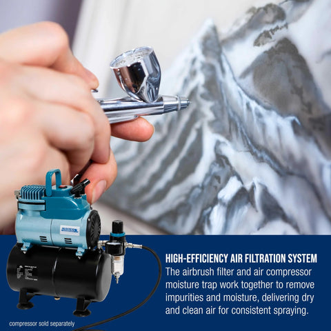 Blue Master Airbrush compressor with regulator gauge and moisture trap connected to a chrome airbrush.