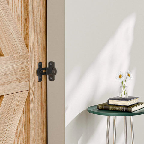 2 Pack 90 Degree Flip Barn Door Lock Set For Privacy And Real Deal Security, installed on wooden barn door, black finish