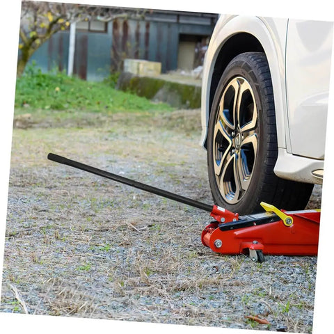 3 Ton Floor Jack Handle Replacement For Automotive Jacks That Fits Pittsburgh Floor Jack Parts And Other Horizontal Hydraulic Car Jacks For Easy Lifts And Smooth No Hassle Operation In Home Or Shop in use lifting car wheel in outdoor setting