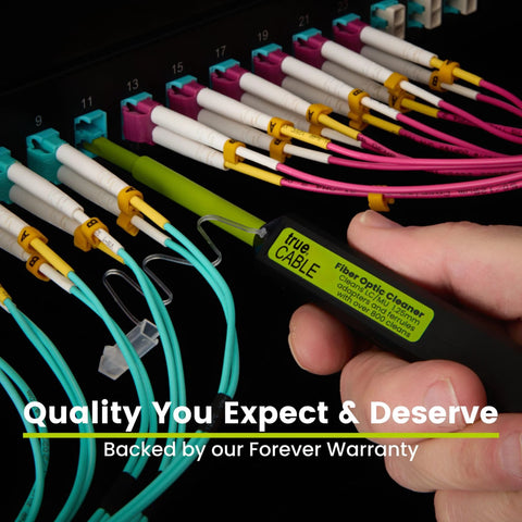 true CABLE fiber optic cleaner pen in hand with green label for LC/MU 1.25mm connectors