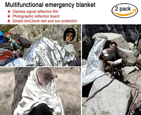 People using multifunctional emergency blankets for warmth outdoors