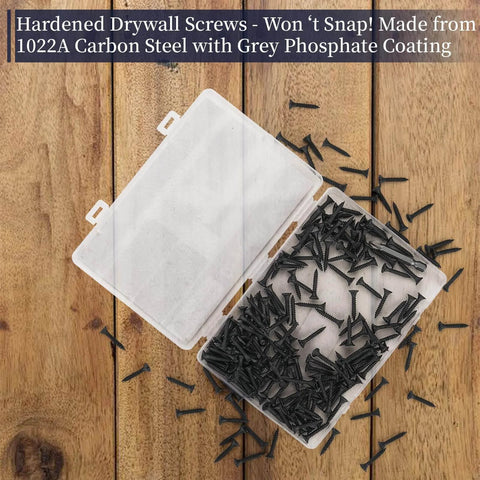 Beefy Heavy Duty Drywall Screws Set Of 200 Size Six By One Inch Coarse Thread Phillips Flat Countersunk Head For Wood Studs And Sheetrock Made From 1022A Phosphated Carbon Steel Grade Eight Point Eight Hardness in open box on wood surface.