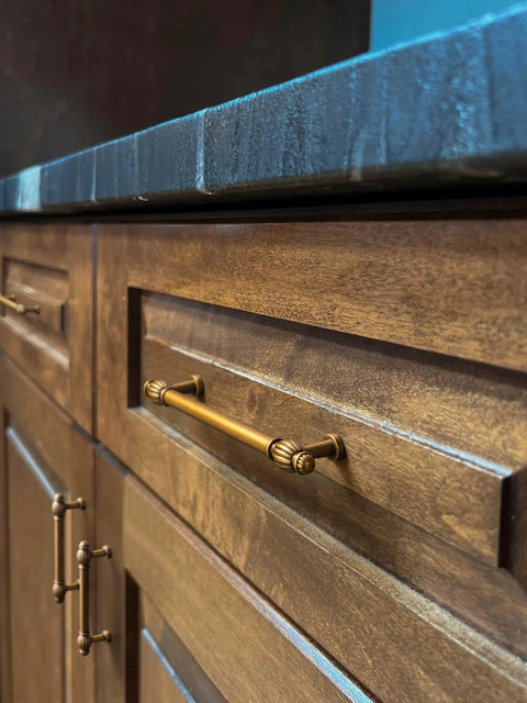 Side view of kitchen cabinet with Six Pack Antique Brass Cabinet Pulls in Zinc Alloy for Kitchen and Furniture, 5.04 Inch Center To Center 128mm