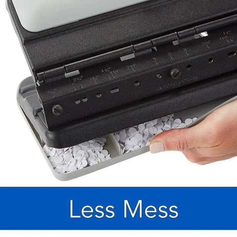 Close-up of Heavy Duty 2 To 7 Hole Punch with adjustable head showing paper waste tray beneath the all-metal construction.