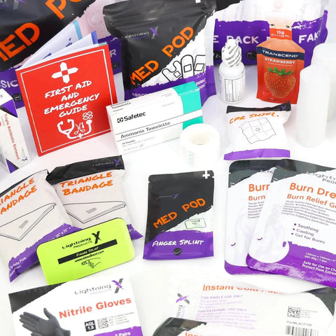 Mid Sized First Responder EMT Kit With 200 Plus BLS Supplies in Fluorescent Yellow Bag showing bandages, gloves, and emergency guide