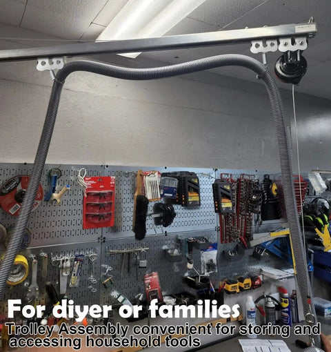 Heavy Duty Four Wheel Hoist Trolley Assembly with Strut Channel Rollers in a workshop setting.