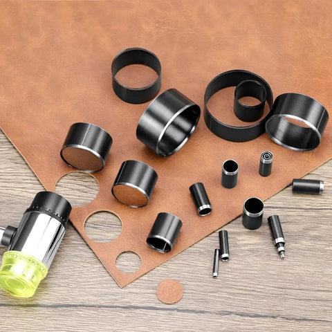 Leather Circle Cutter Tool Set With 21 Piece Pro Grade High Carbon Steel Punch Kit displayed with punched leather pieces