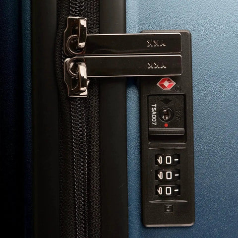 TSA approved lock on the Ultimax II 26 Inch Medium Trunk Spinner Luggage With Tie Down Straps Matte Navy Durable Polycarbonate Hardshell
