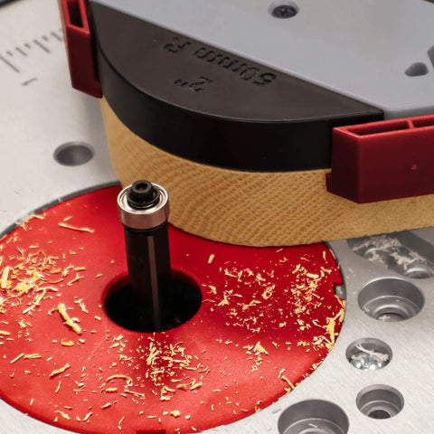 Corner Radius And Chamfer Router Jig With 8 Slick Profiles, Built-In Storage, And Dual Bearing 1/2 Inch Router Bit Included in use.