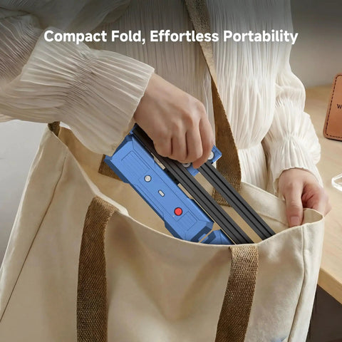 Person placing Foldable 7000mW Laser Engraver With 200x150mm Working Area For Wood Leather And Acrylic, Artilume T1 Portable Laser Cutter into a bag