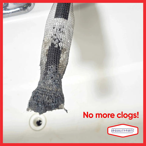 Washing machine lint trap in black mesh attached to hose, clogged with lint