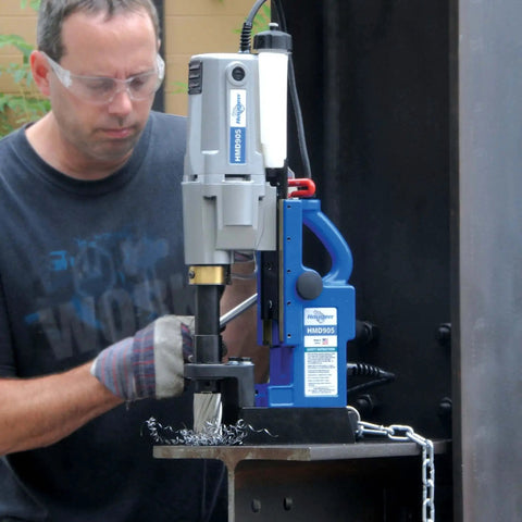 Workhorse Magnetic Drill With Coolant Bottle And Two Speed 115V For Precise Holes, 2 In Max Diameter, 2 In Depth in use on metal