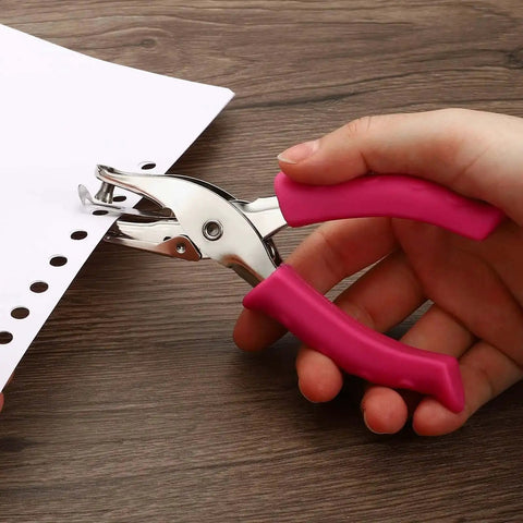 Person using One Quarter Inch Hole Punch Handheld With Soft Grip Ergonomic Handle For DIY Crafts Scrapbooking Tags And Tickets Card Making 6mm Metal Paper Puncher Non Slip Removable Handle Portable Green on paper