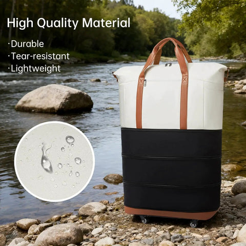Expandable Travel Duffle Bag With Wheels That Grows From Compact To 130L beside river, showing water-resistant material