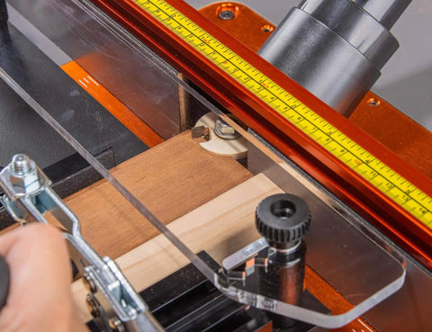 Close-up of Pro Grade Rail Coping Sled Router Table Jig for cabinet doors, showing precise coping for rail and stile joints.
