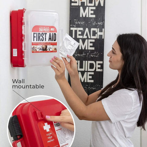 Professional 350 Piece First Aid Kit With Wall Mountable Dual Layer Hard Case, woman accessing supplies in office or classroom.