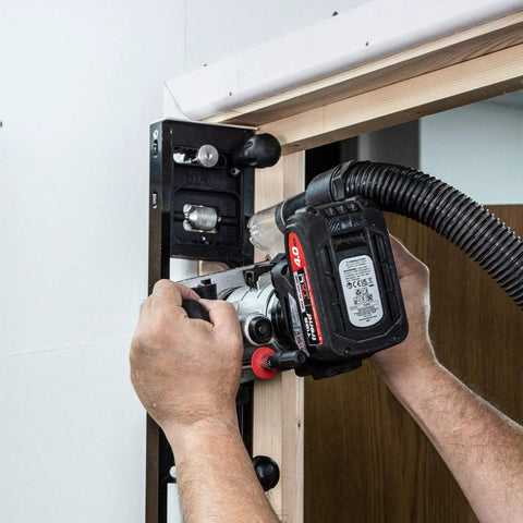 Butt Hinge Template Kit With Fully Adjustable Router Jig in use on wood door frame, handles hinge sizes 2'6" to 9'