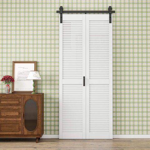 40x84 Inch Bifold Barn Door With 44 Inch Track Hardware Kit Included Preassembled MDF Panel PVC Surface in living room setting.