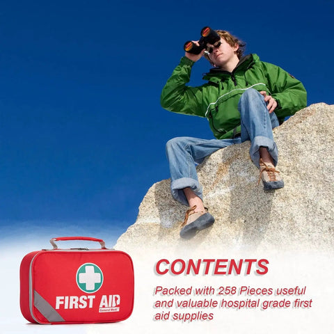 Person on rock with binoculars and 2 In 1 First Aid Kit Set With 215 Hospital Grade Items Plus 43 Piece Mini Kit in foreground