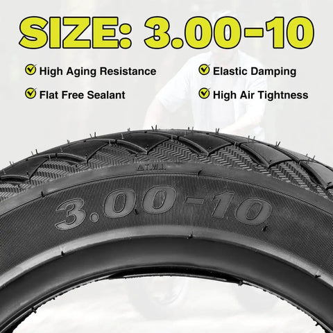 Close-up of Tubeless 3.0-10 E-Bike Tire Kit with text on high resistance, elastic damping, shown in urban background.