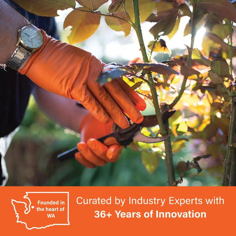 Person wearing Orange Nitrile Disposable Gloves With Raised Diamond Grip Mechanic 100 Count while pruning plants
