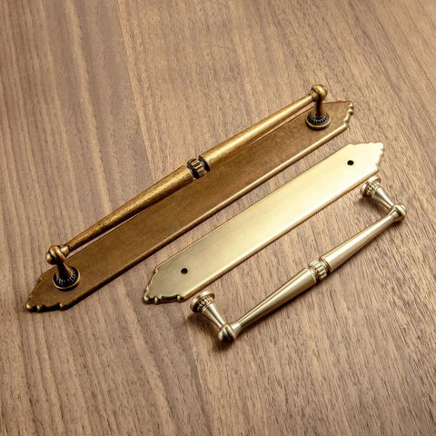 Champagne Bronze Cabinet Pulls 5.04 Inch Center To Center With Back Plate Zinc Alloy 2 Pack on wooden surface