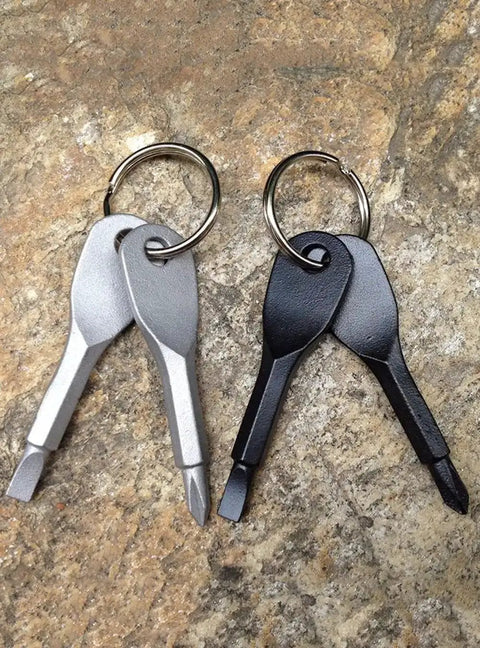 Two Pack Mini Key Shape Screwdriver Set With Flathead And Phillips Bits, Stainless Steel Key Chain Tools on stone surface