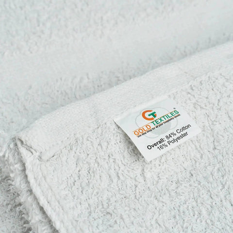 Close-up of Heavy Duty Pro Grade White Cotton Blend Hand Towels Bulk Pack 120 Pcs 16x27 Inches Rags In A Box label