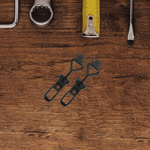 Heavy Duty Adjustable Toggle Latch Clamp With Quick Release Metal Pull Latch, black iron, shown on wooden surface with tools.