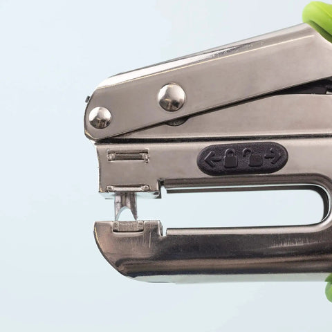 Side view of Crop-A-Dile Power Punch for one quarter inch holes scrapbooking tool showing punch mechanism close-up
