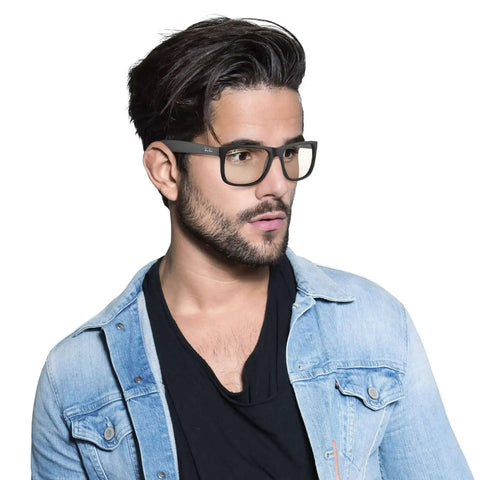Man wearing RB4165 Justin Unisex Rectangular Sunglasses With Lightweight Rubber Black Frame And Clear Lenses For Everyday Wear And Travel