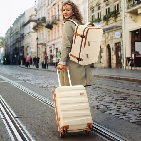 Person with Flight Ready Luggage Set With Backpack, 20 Inch Carry On Polycarbonate Hardshell Suitcase With Spinner Wheels