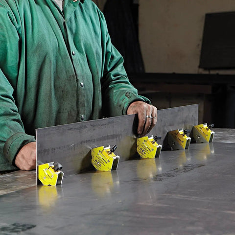 Pro Grade Mini Multi Angle Welding Magnet For Metal Fabrication With 150 Lb Holding Force in use on metal sheet