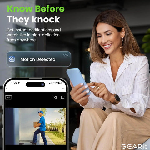 Woman using phone with video screen showing 2K QHD Video Doorbell Camera With Chime Battery Powered Wireless For Home IP64 Weatherproof Motion Detection Two Way Audio Real Time Alerts No Fuss Setup And Long Lasting Battery.