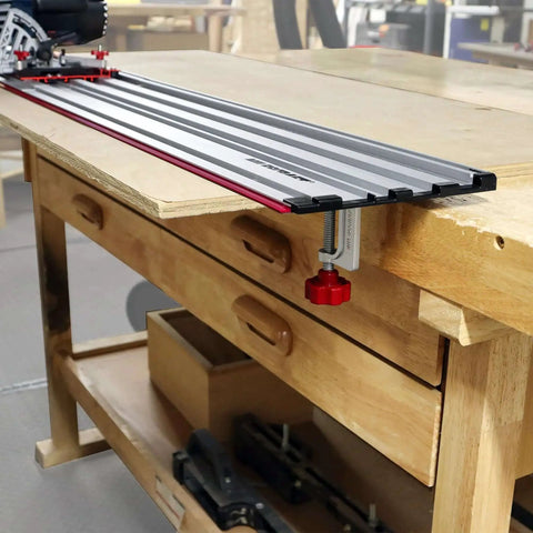 Universal Track Saw Guide For 7-1/4 Inch Circular Saws With 50 Inch Cutting Range And 2 Inch Depth Aluminum Construction shown on workbench