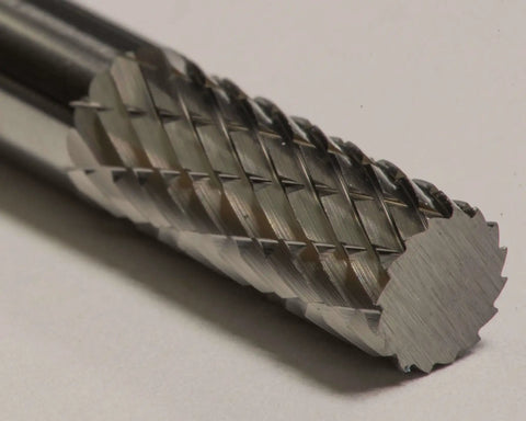 Close-up view of ATZ10003 Quarter Inch SA1 Cylinder Bur Double Cut Solid Carbide showing precision cutting edges for metalwork.