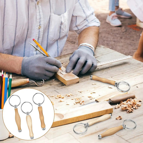 Person using a 12 Piece Wood Turning Keychain Kit Set For DIYers And Woodworking Fans Includes Woodturning Mandrel And Accessories Perfect Gift For Carpenters And Hobbyists With 7mm Shank And Silver Finish on a table with tools and completed keychains.