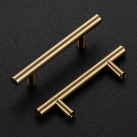 Champagne Bronze Stainless Steel Cabinet Handles Set of 30 With 3 Inch Center To Center Holes displayed on dark background
