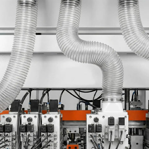 Industrial setup with 30 Ft Long 6 Inch PVC Dust Collection Hose Flexible Puncture Resistant Vacuum Hose With 8 Stainless Steel Clamps