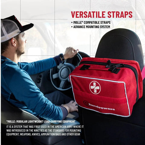 Driver-side view of a red survival first aid kit attached to a car seat using MOLLE straps, highlighting versatile mounting for emergencies.