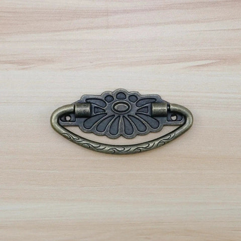 Four Antique Bronze Drop Swing Drawer Pulls With Screws Drop Bail Handles for cabinets, showing zinc alloy design and rustic finish.