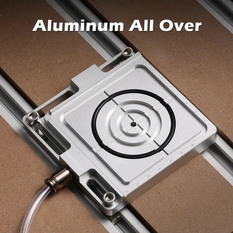 Aluminum No Fuss Vacuum Clamp Pod For CNC Routers And Milling Projects, 4.7 x 4 x 0.6 inch workholding system on wood surface.