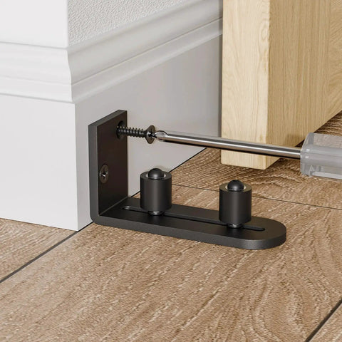 Adjustable Sliding Barn Door Floor Guide With Flat Bottom Design In Black 1 Piece Heavy Duty Steel Rail Nylon Roller installation