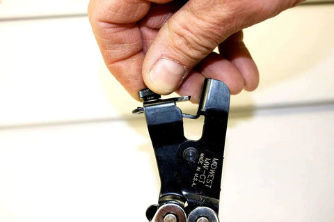 Hand using J Channel Notcher And Siding Cutter Combo Tool For Vinyl And Aluminum, Two Tools In One, built tough in the USA