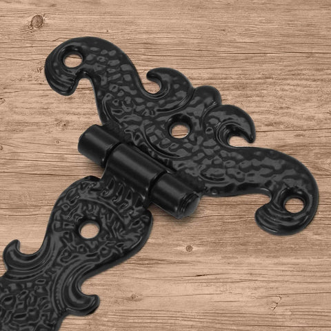 Antique T Strap Hinge in black zinc alloy on wood surface, part of a four-piece set for cabinets and decorative projects, 4.45x2.76 inches.