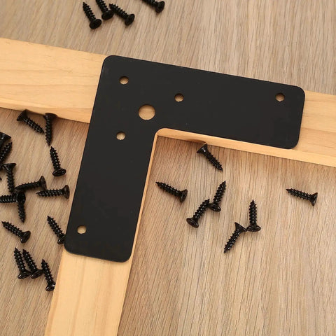 Beefy L Shaped Corner Brackets 4 By 4 By 1.25 Inch Pack Of 10 Black Steel Right Angle Mending Plates with screws on wood surface