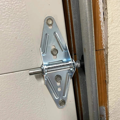 Installed two eighteen gauge narrow body garage door hinge in cold rolled steel with galvanized finish on residential door